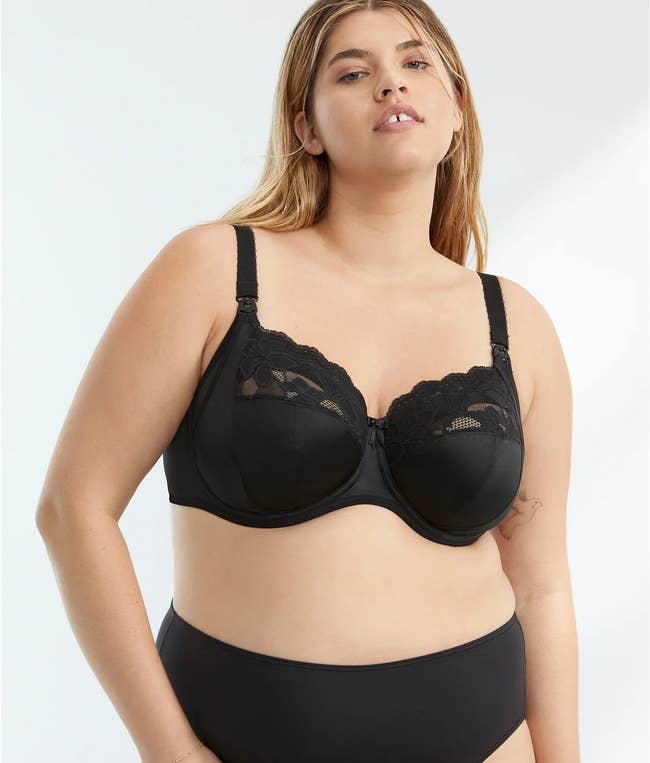 A model posing in the black bra