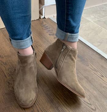 Image of reviewer wearing taupe boots