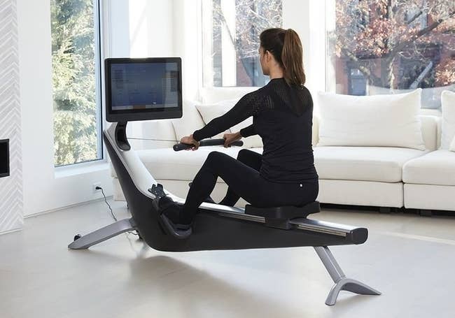 Product image of model working out on rowing machine