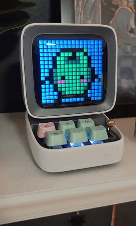 a gif of a junimo from stardew valley dancing on the bluetooth speaker screen