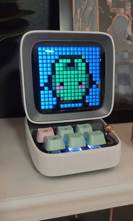 a gif of a junimo from stardew valley dancing on the bluetooth speaker screen