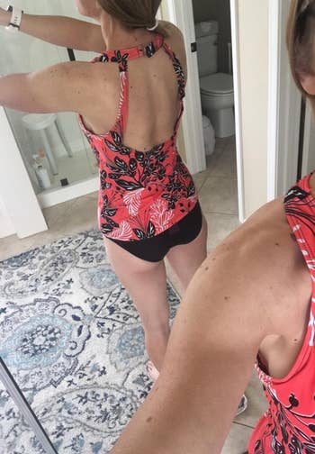 another reviewer wearing a red floral print tankini set