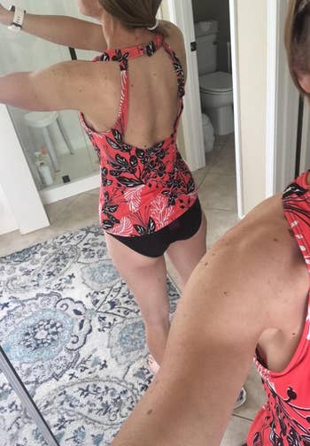 another reviewer wearing a red floral print tankini set