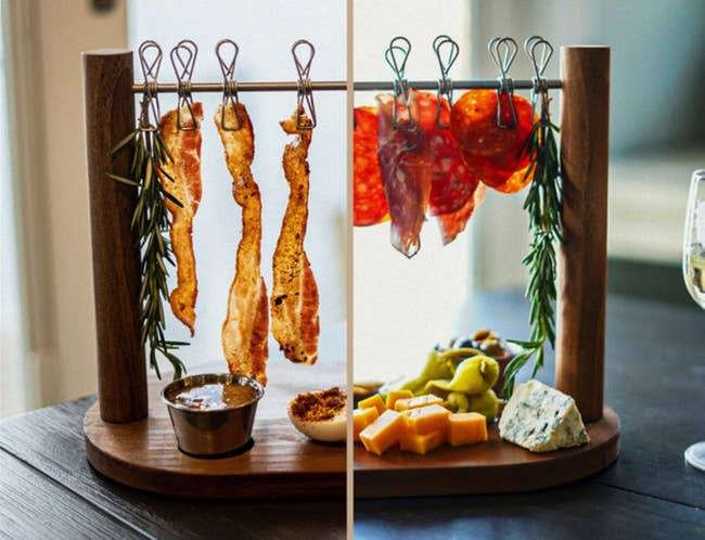 the board holding bacon, meat cuts, and different cheeses