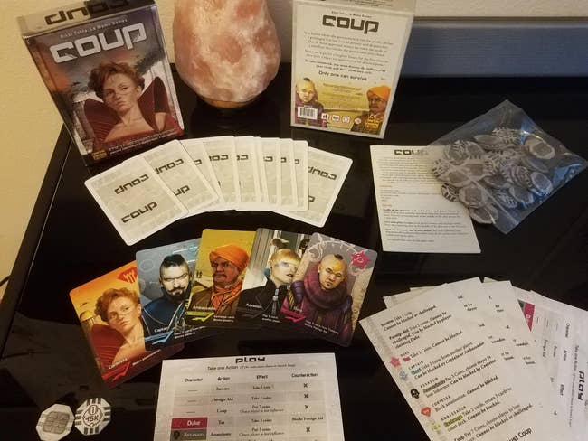 reviewer photo of the card game spread out on a table