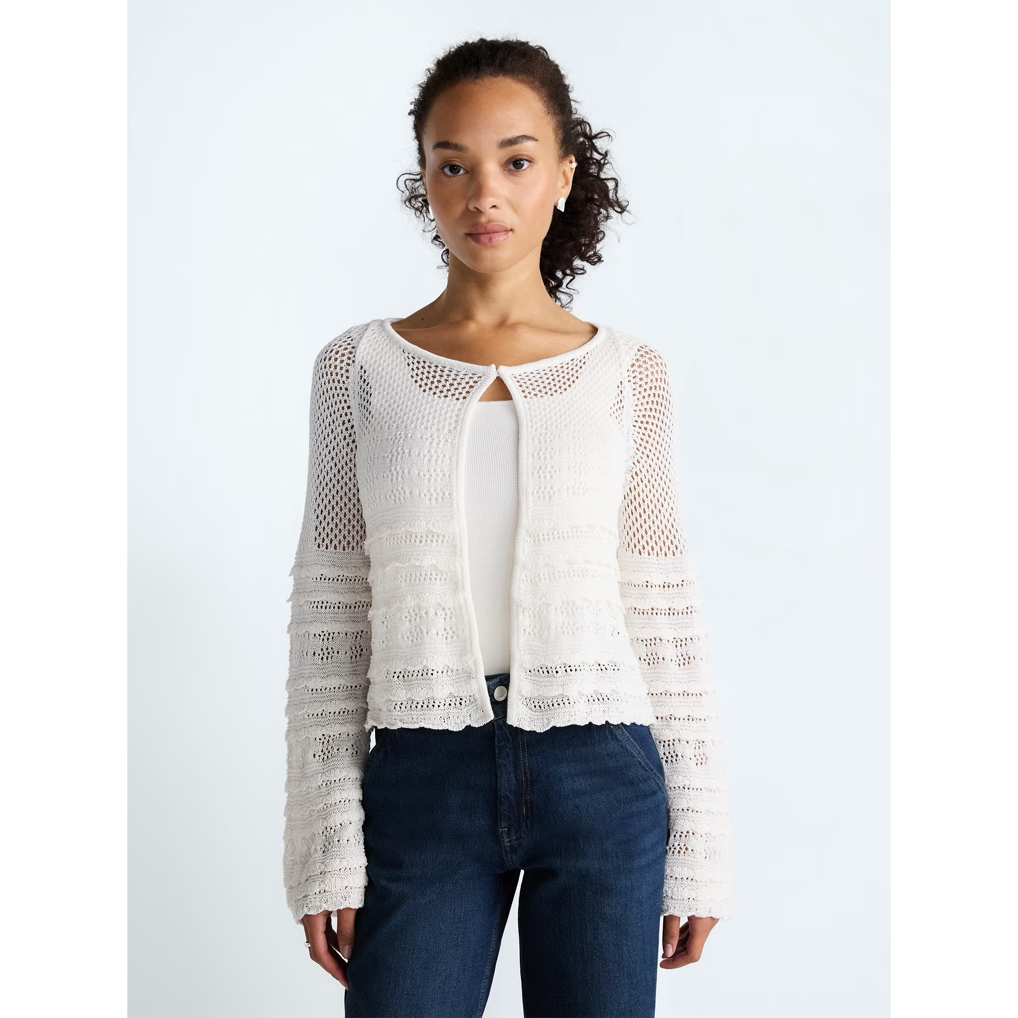A exemplary  wearing the cardigan