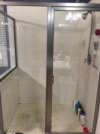 after image of the same shower door now completely clean and see-through
