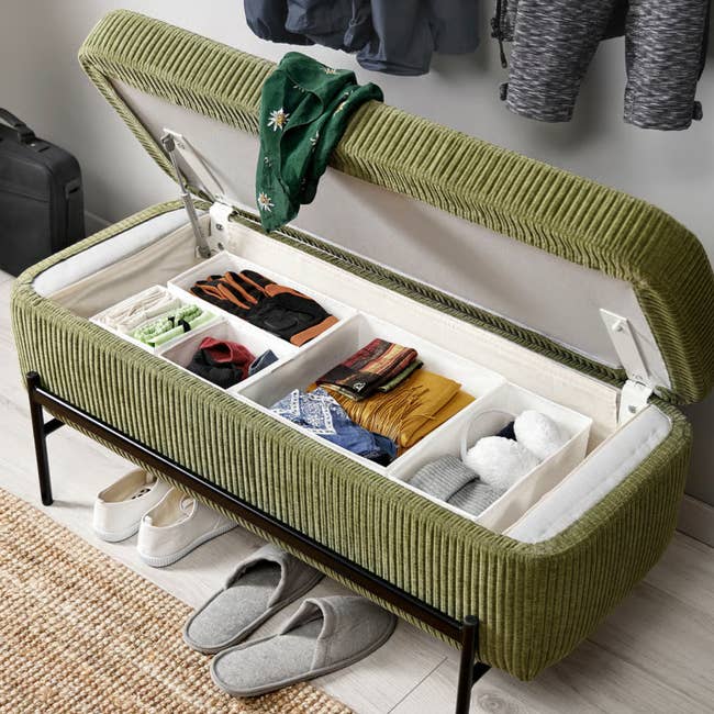Open retention  seat  with folded clothes, slippers, and accessories organized successful  compartments, perfect  for entryway oregon  closet organization