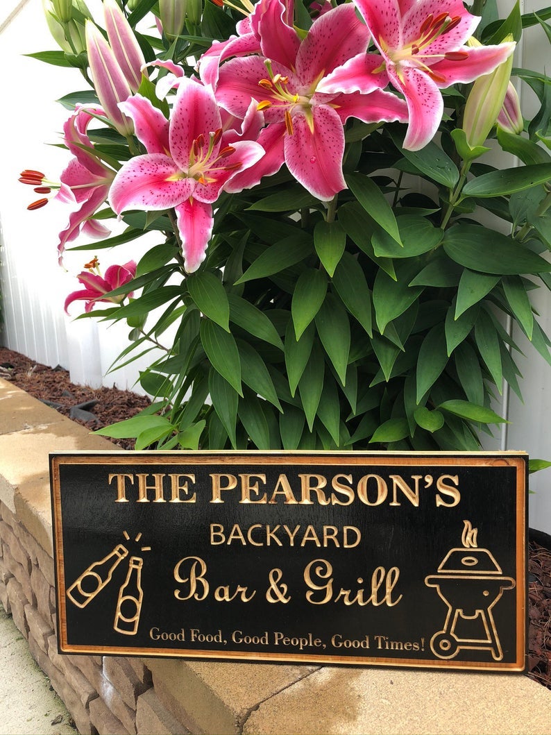 a wood sign that reads,