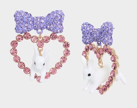 statement earrings with purple sparkly bow posts and pink jeweled heart drops with white rabbits jumping through them