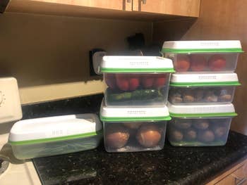reviewer photo of storage containers on counter full of different produce