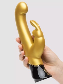 Model holding gold vibrator