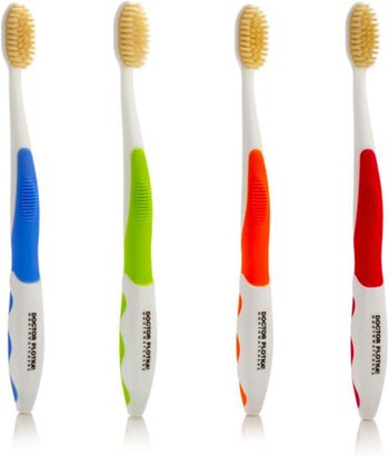 four of the toothbrushes in assorted colors