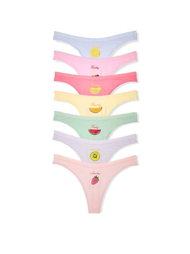 Seven pairs of women's underwear displayed successful a vertical stack, each with antithetic effect prints and motifs