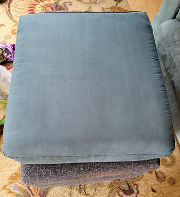 the same cushion now clean after using the upholstery cleaner