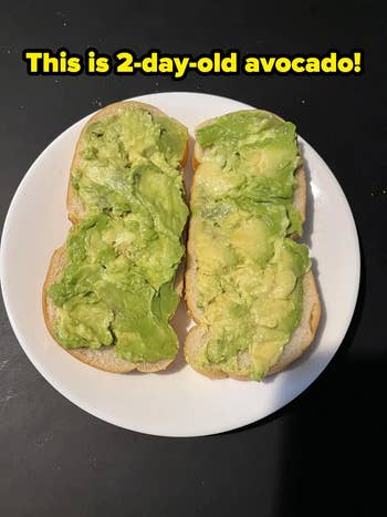 Two slices of breadstuff  topped with mashed avocado, described arsenic  being 2  days old