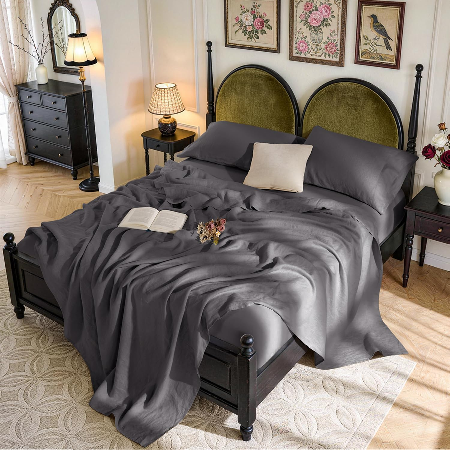 Luxurious bedroom with an elegant bed set, featuring rumpled sheets and an open book, creating a cozy and inviting ambiance