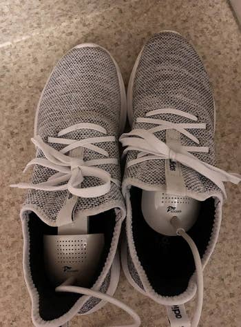 a reviewer photo of the drying units inside a pair of sneakers 