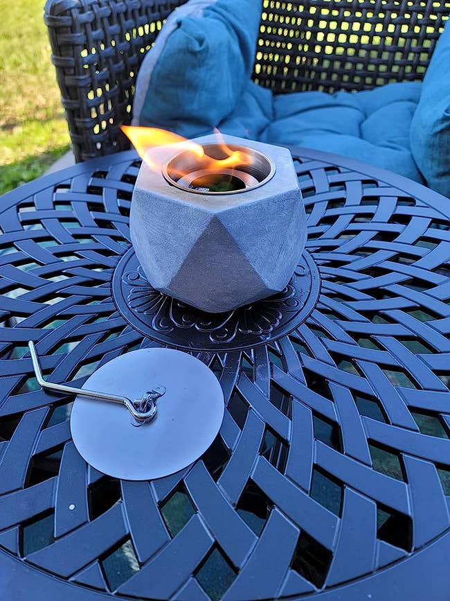 reviewer's tabletop fire pit on a table