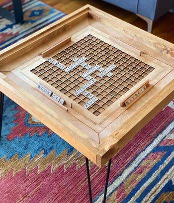 the Scrabble coffee table with the top off