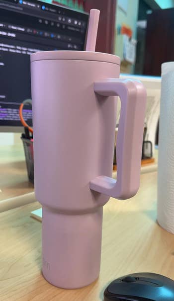 reviewer photo of the tumbler in lavender mist