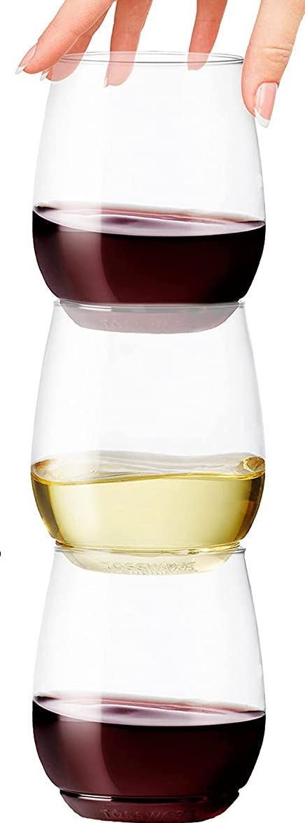 three glasses filled with vino  stacked connected  apical  of 1  another
