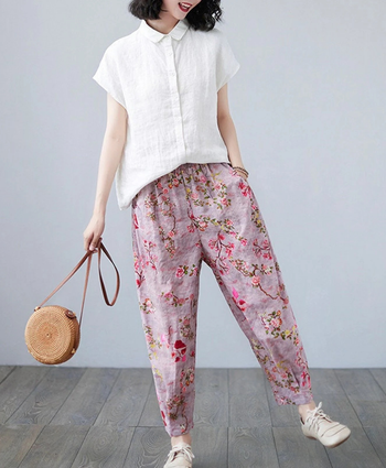 model wearing the pink floral pants