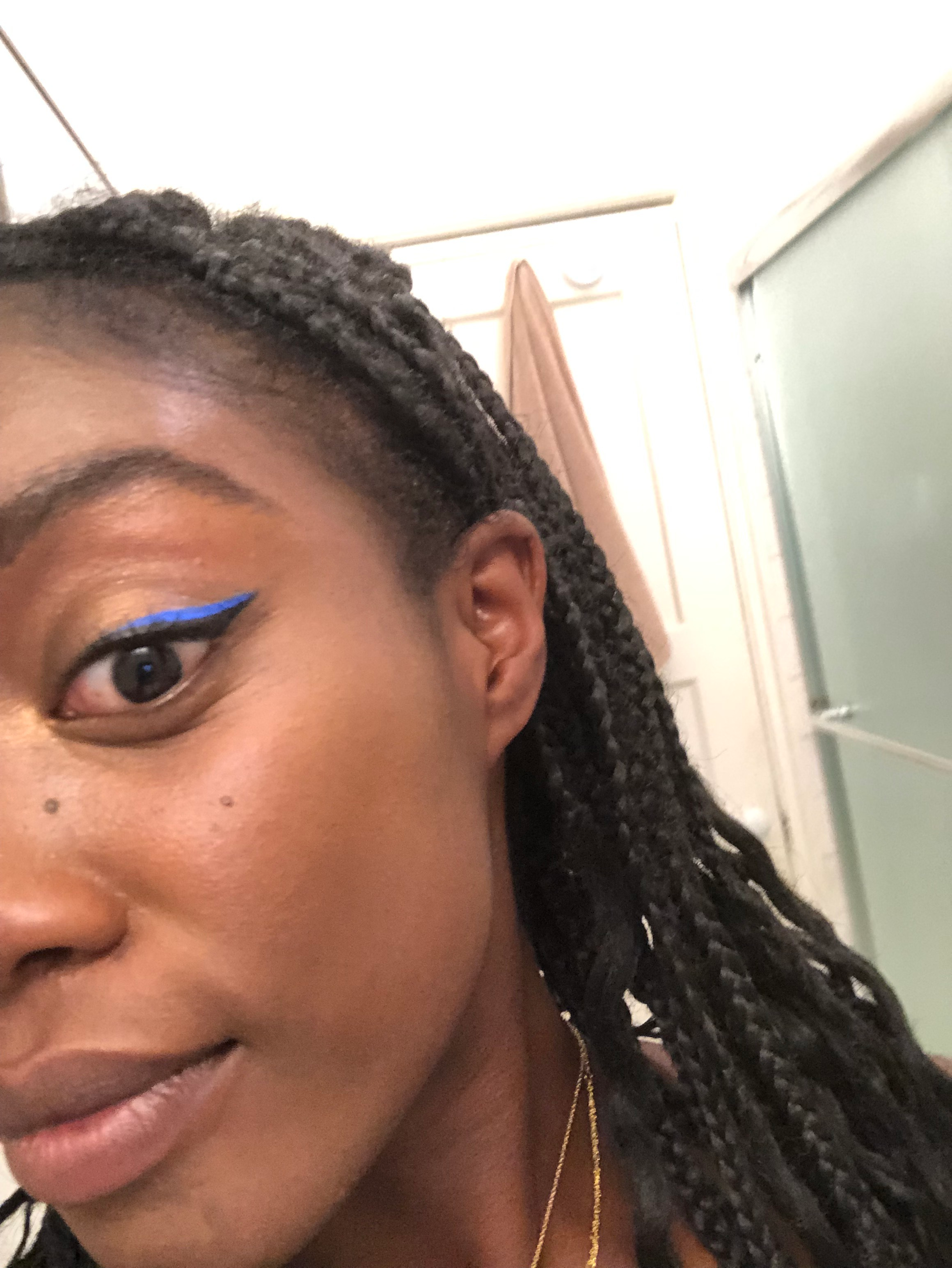 Amanda wearing blue liner above black
