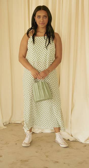 model in green checkered linen midi dress