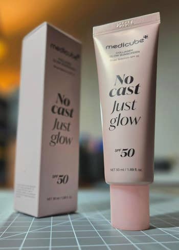Tube and box of Medicube Collagen Glow Sunscreen labeled 