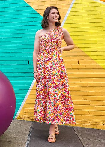 reviewer in multicolor floral midi dress