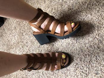 Reviewer wearing brown platform heels