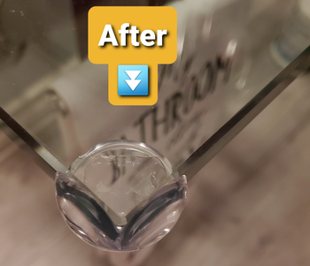 after image of reviewer's glass table with clear guard on the corner 