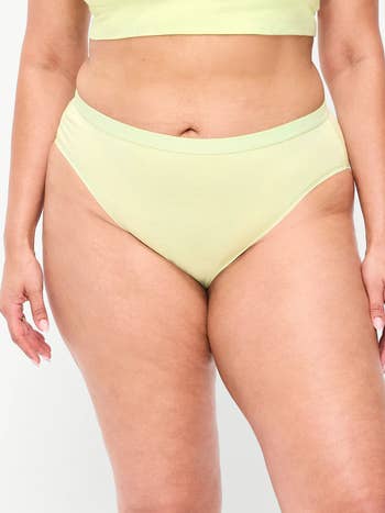 Person wearing a simple, comfortable-style underwear set