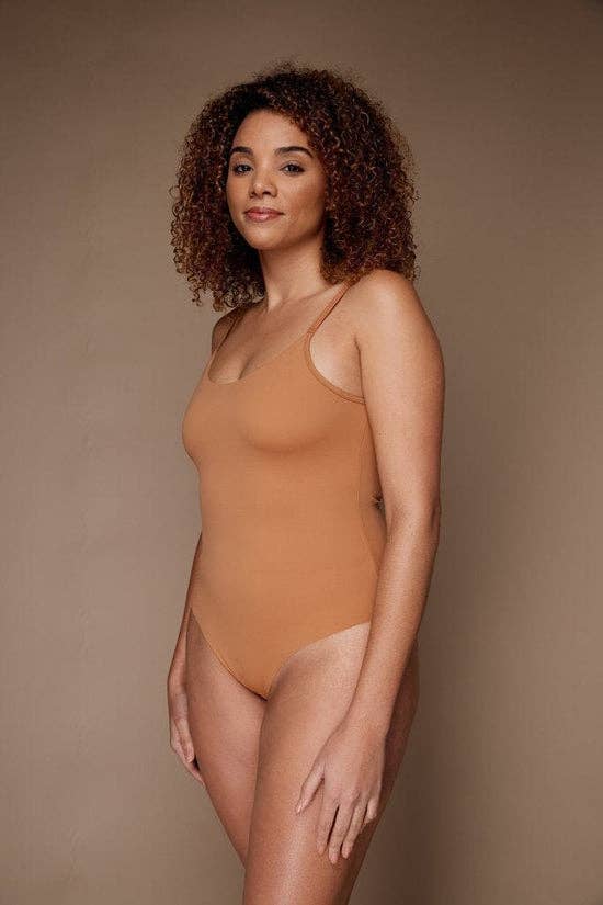 model in nude bodysuit