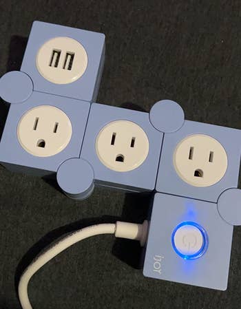 reviewer photo of the power strip in light blue