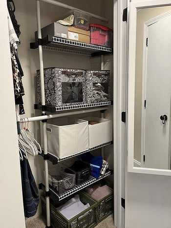 reviewer photo of the closet system inside linen closet