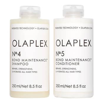 White shampoo and conditioner bottles on a white background