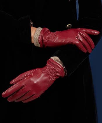 model wearing the gloves in red
