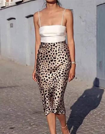 model in the leopard print skirt