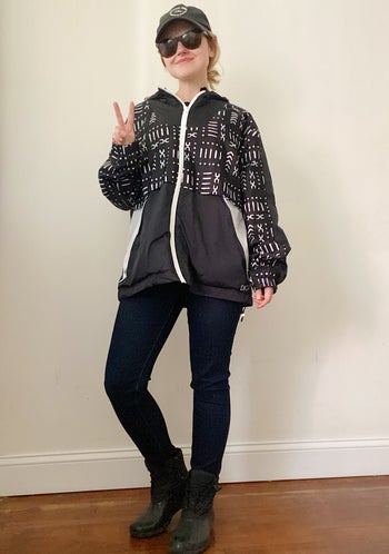 BuzzFeeder wearing the black and white windbreaker