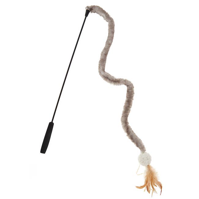 A whip-like plastic handle with a long, furry piece of fabric on the end
