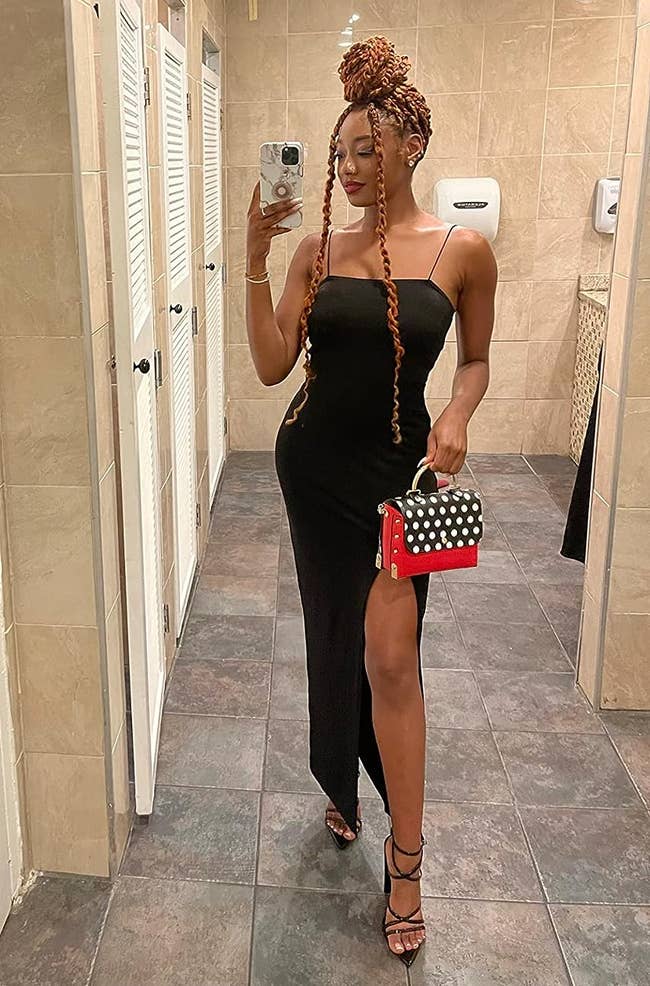 reviewer posing successful achromatic maxi formal with slit