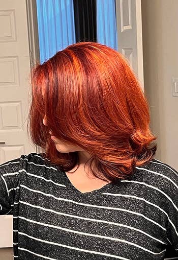 another reviewer's freshly styled short red hair