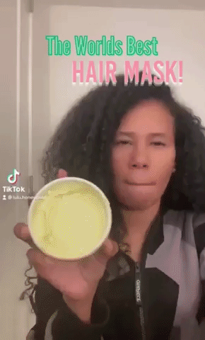 the CEO applying the mask to their hair in a gif