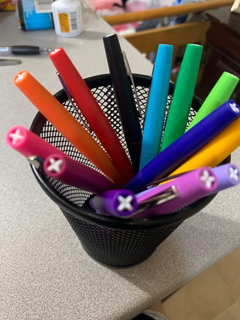 the pens in a pen holder