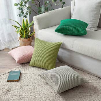 the throw pillows in various colors