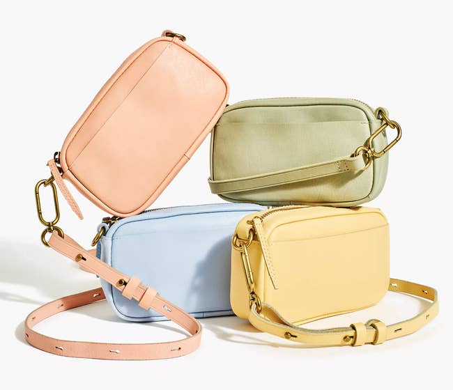 four different pastel colored crossbody bags