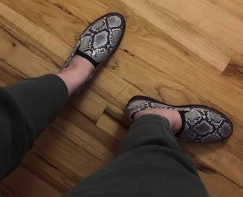 reviewer in the snakeskin loafers