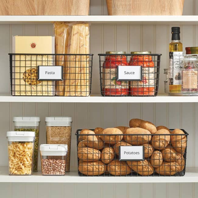 Shelf with neatly organized wire baskets labeled